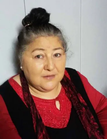 Portrait of an elderly lady with a bun