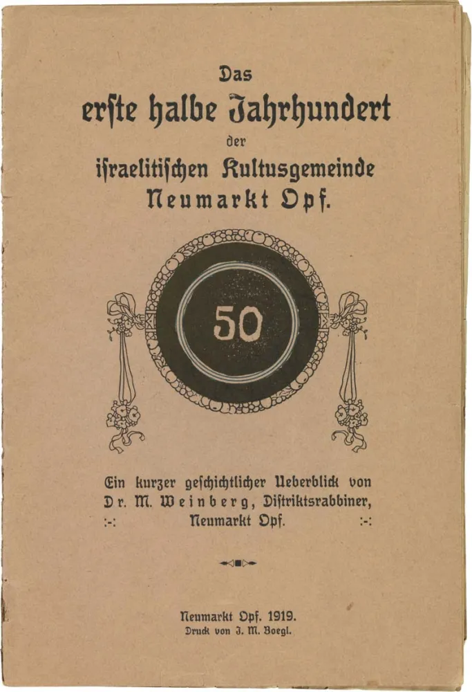 Paperback, printed, illustrated with the number “50” in a wreath